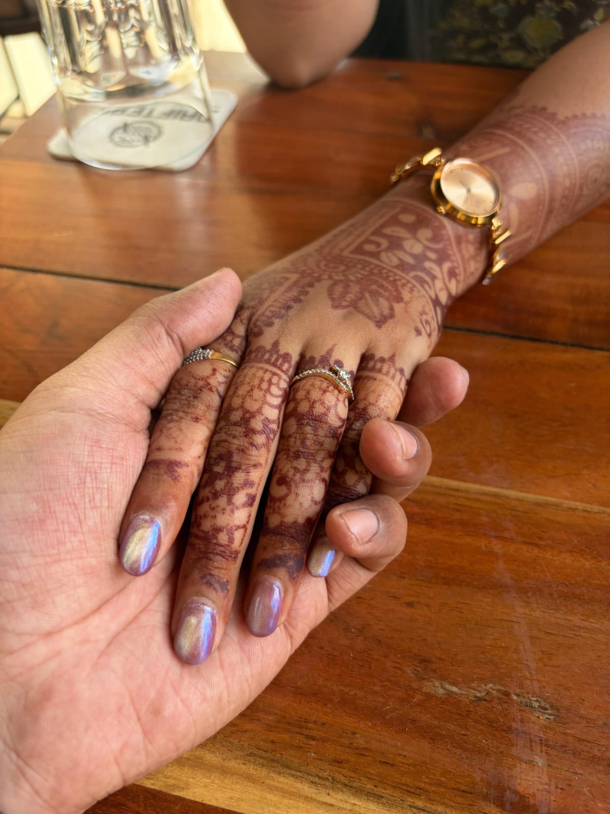 Holding her hand